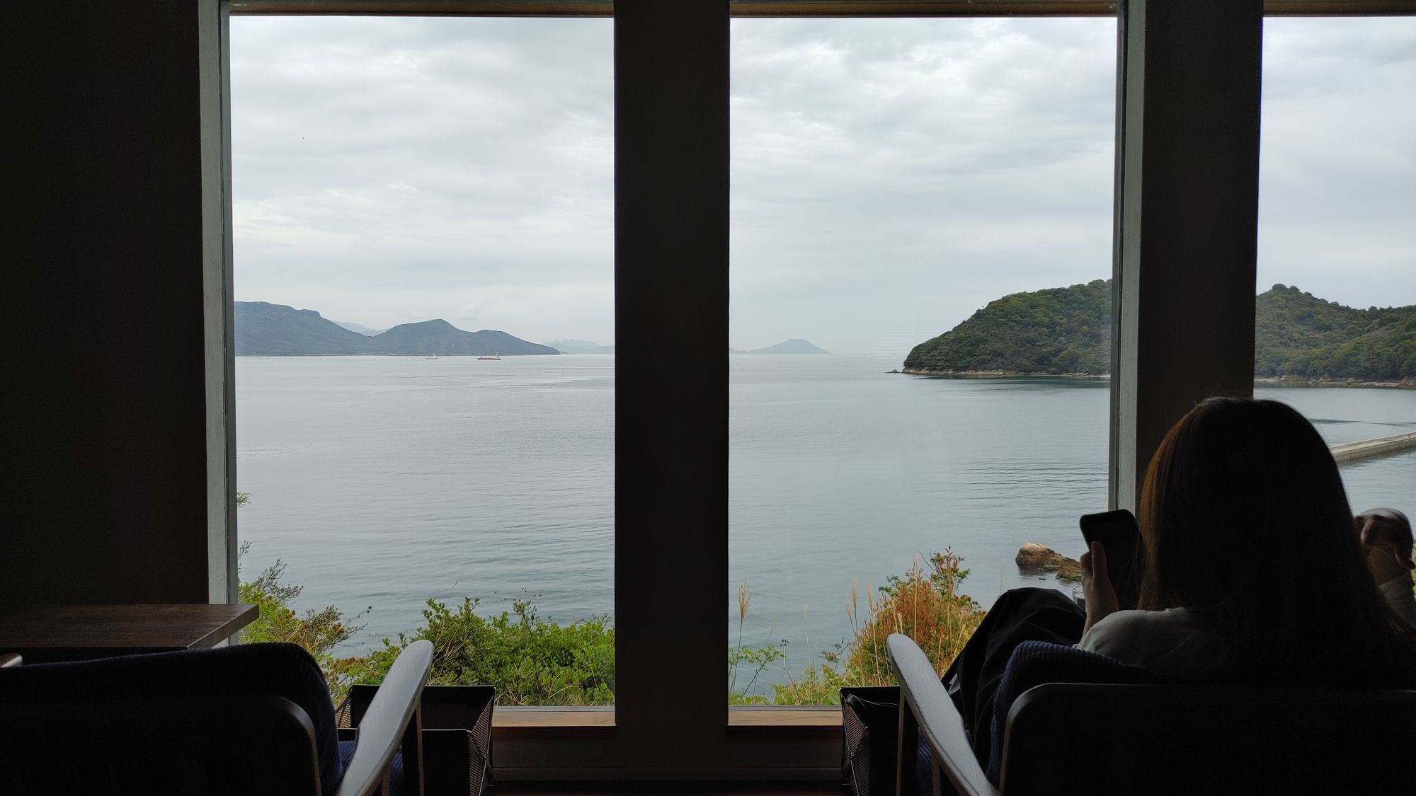 view from the cafe windows overlooking the water will small islands nearby